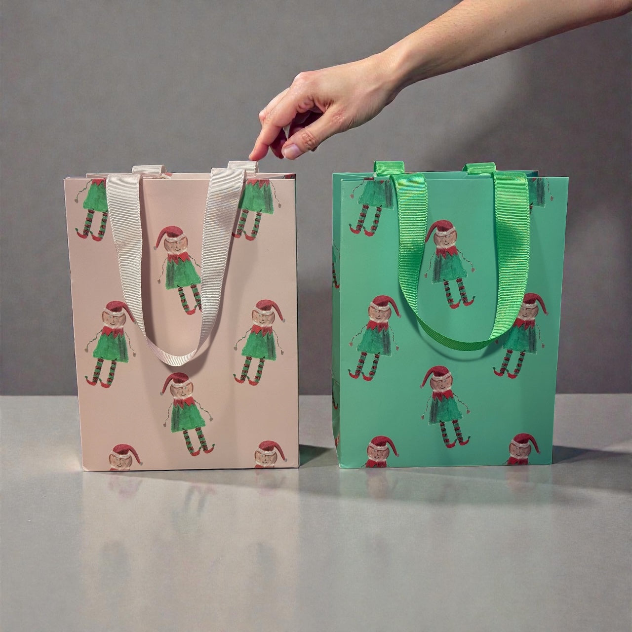 
                  
                    Elf Holiday Gift Bags - Set of 4 (Multiple Styles Available)
                  
                