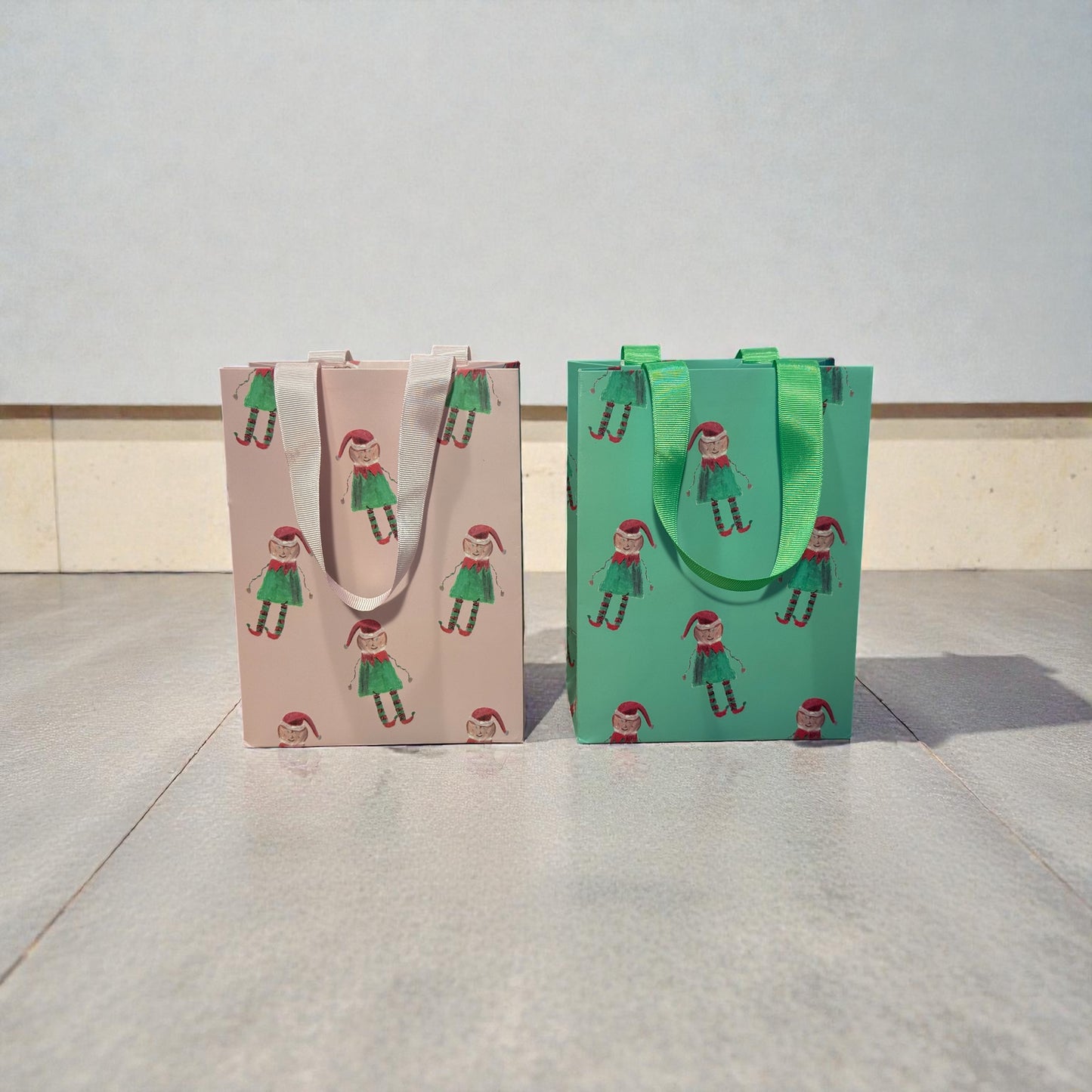 
                  
                    Elf Holiday Gift Bags - Set of 4 (Multiple Styles Available)
                  
                